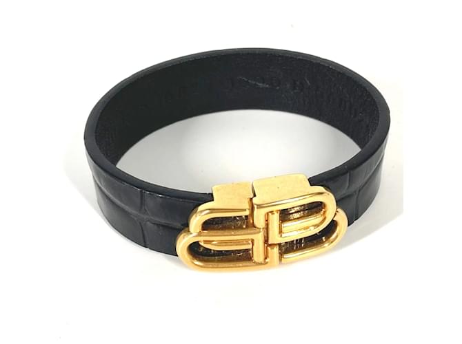 Pulsera de bangle negra y dorada Balenciaga 656827 Negro Cuero  ref.1554643