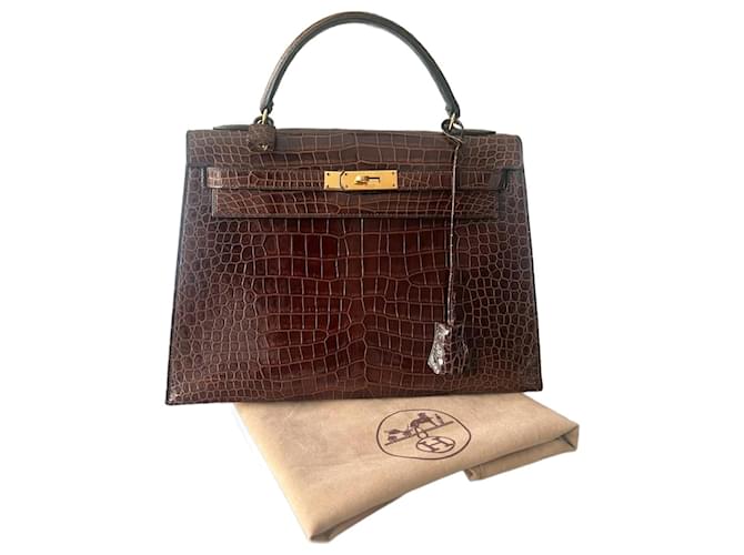 Hermès Kelly 32 crocodile porosus brown handbag Exotic leather  ref.1557832