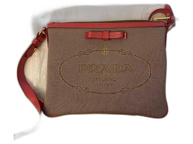 Bolsa Prada bege de couro e tecido