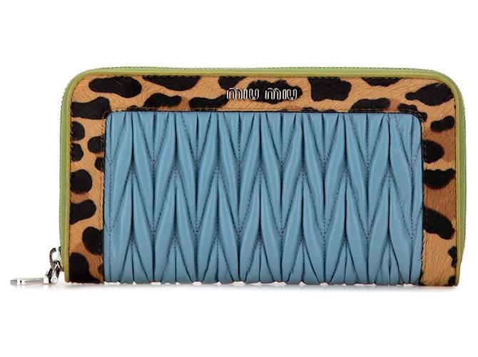 Carteira Miu Miu em nappa matelassé com estampa de leopardo Cavallino azul Lona  ref.1561011