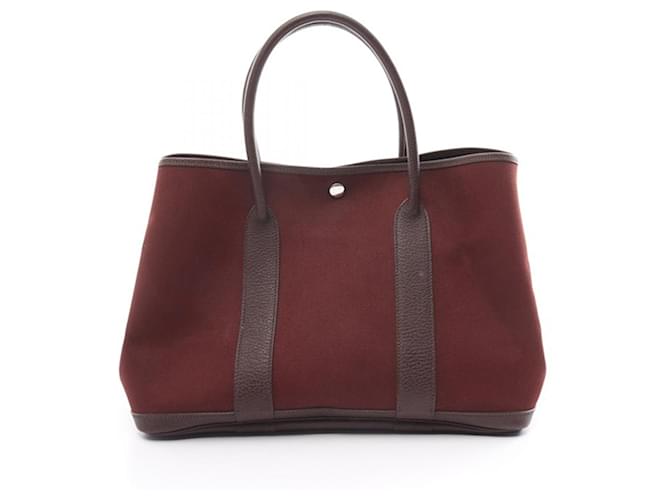 Sac tote Garden Party 36 en Toile Hermès rouge Cuir  ref.1561038