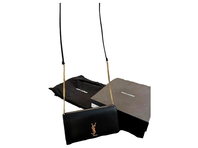 Borsa a mano Yves Saint Laurent in pelle nera e oro Nero D'oro