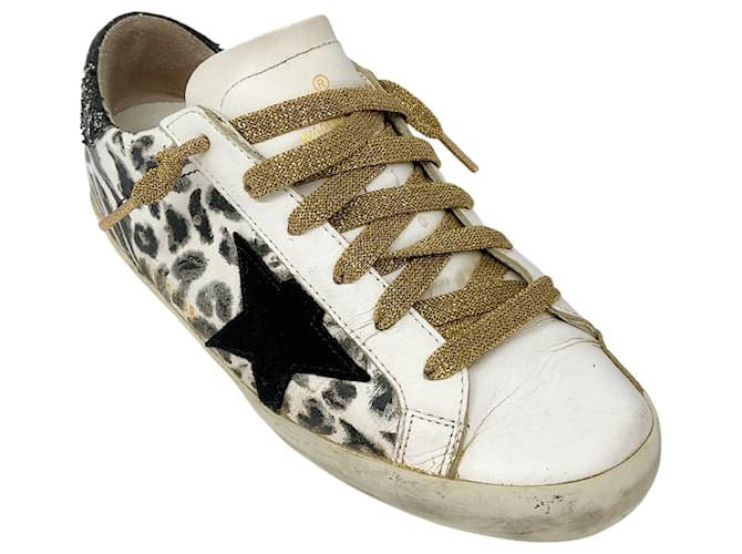 Golden Goose Sneaker Superstar in pelle con stampa leopardata GGDB bianco nero oro metallico ref.1566870 Joli Closet