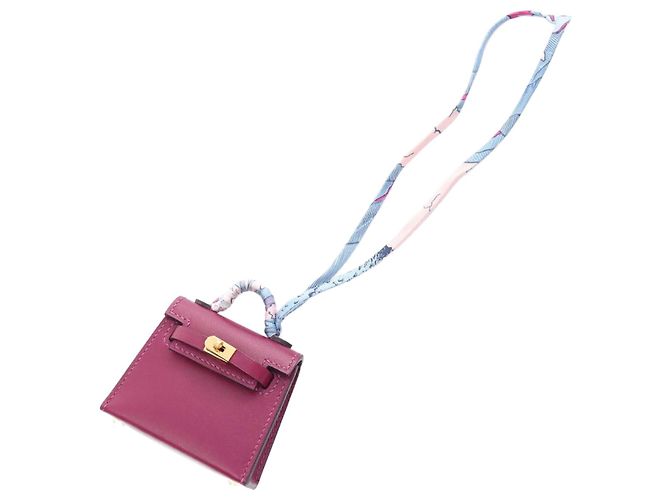 Charm Twilly Kelly di Hermès Porpora