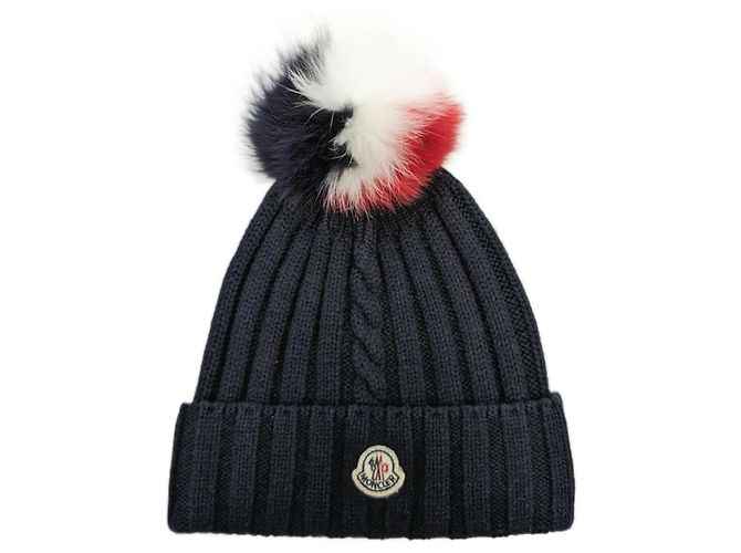Gorro Moncler de lã azul marinho com pompom de raposa