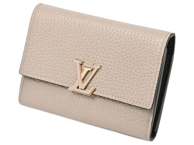 Carteira compacta tri-fold Capucines da Louis Vuitton