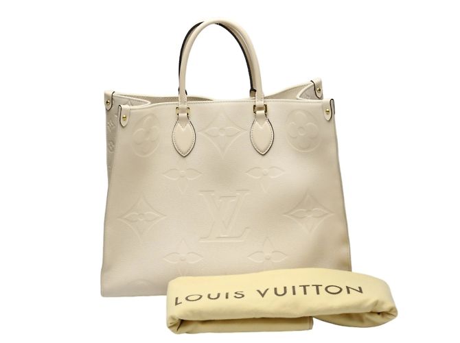 Bolsa tote Monogram Empreinte Louis Vuitton Bege
