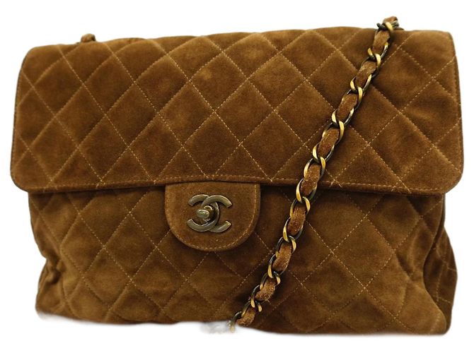 Sac à épaule en daim marron Chanel