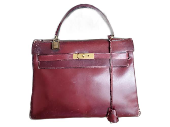 Hermès Kelly 32 Dark red Leather  ref.1638273