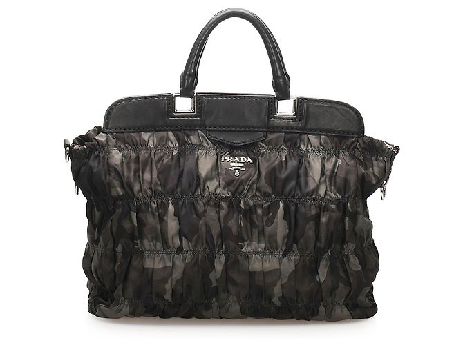 Bolsas PRADA T. Couro