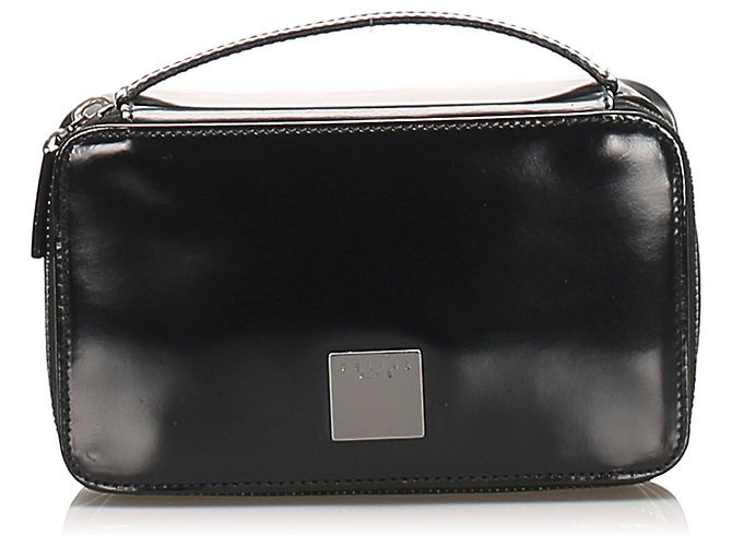 Céline Bolso Vanity de charol negro Celine