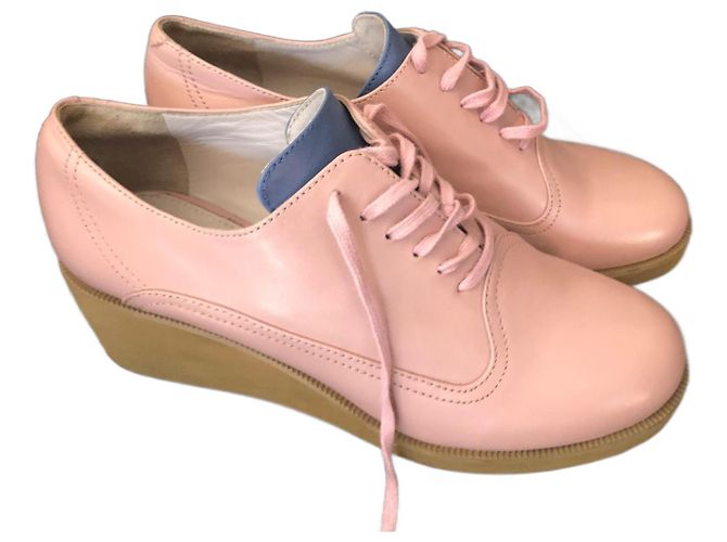 Mules compensées en cuir Jil Sander rose