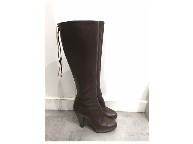 Alaïa Botas ALAIA T.EU 35 Cuero Castaño