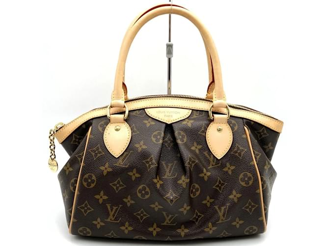 Louis Vuitton Tivoli PM Handbag Brown Patent leather Cloth  ref.1746917