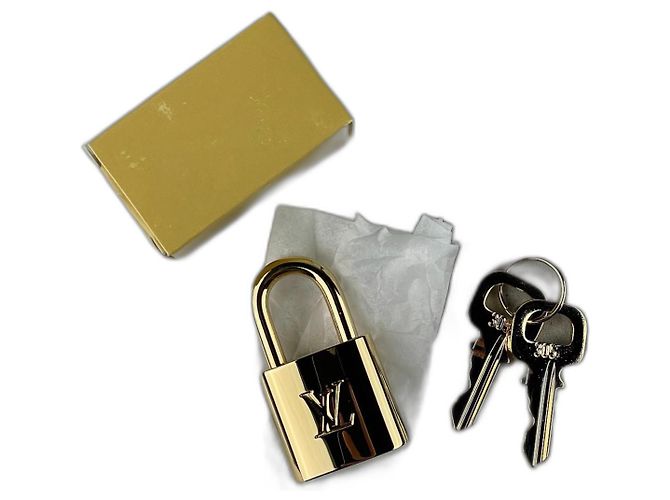 Lucchetto Louis Vuitton D'oro