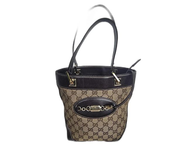 Bolsa Gucci de lona e couro marrom