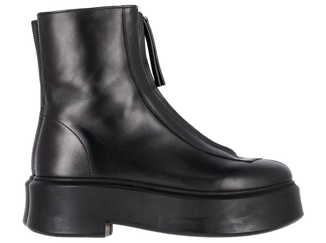 As botas ankle chunky com zíper frontal em couro preto da The Row