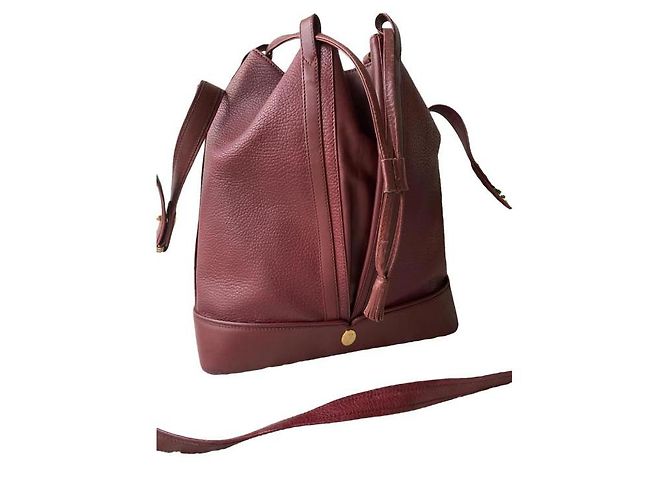 Bolso tipo bucket Cartier Must rojo oscuro piel Burdeos