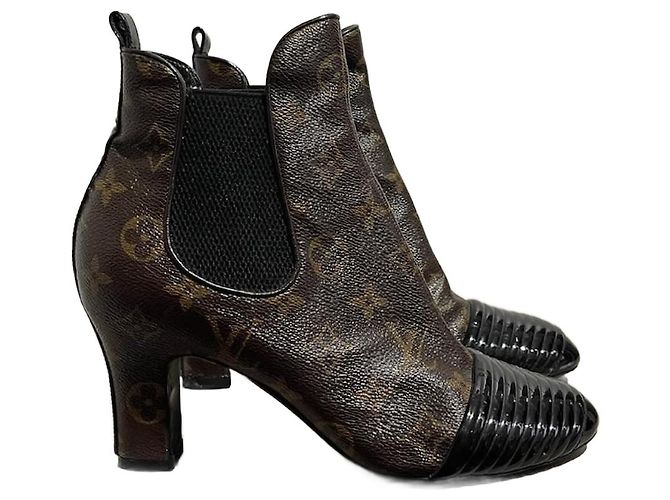 Botas de tornozelo LOUIS VUITTON T.EU 37.5 Tecido Marrom