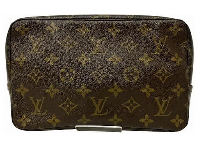 Louis Vuitton Monogram Toiletry Clutch  Brown Cloth  ref.1825819