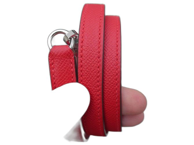 Alça Hermès para bolsa Hermès Kelly em couro vermelho, nova, nunca usada.