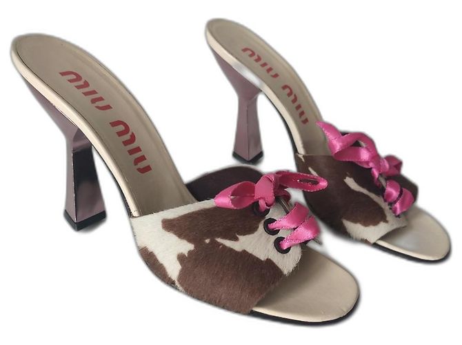 Mule Miu Miu in pelle marrone rosa