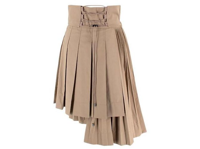Christian Dior Falda plisada asimétrica beige Dior
