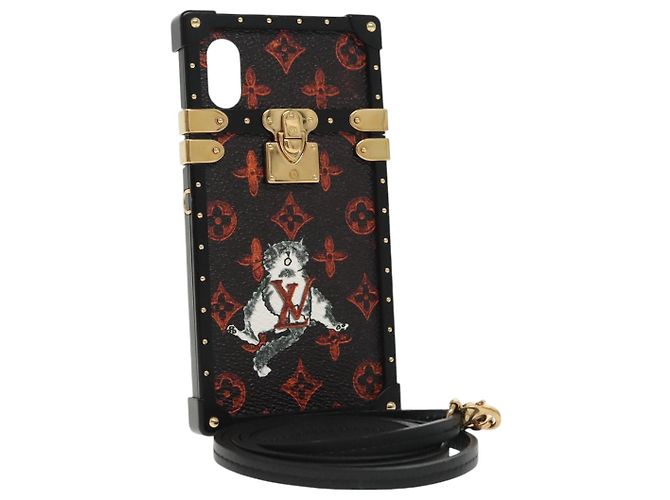LOUIS VUITTON Monograma transformado Gato iphone X Eye Trunk M63891 LV Auth 87378 Negro
