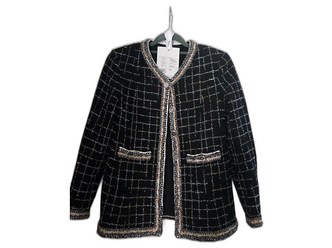 Giacca Chanel in tweed nero a quadri