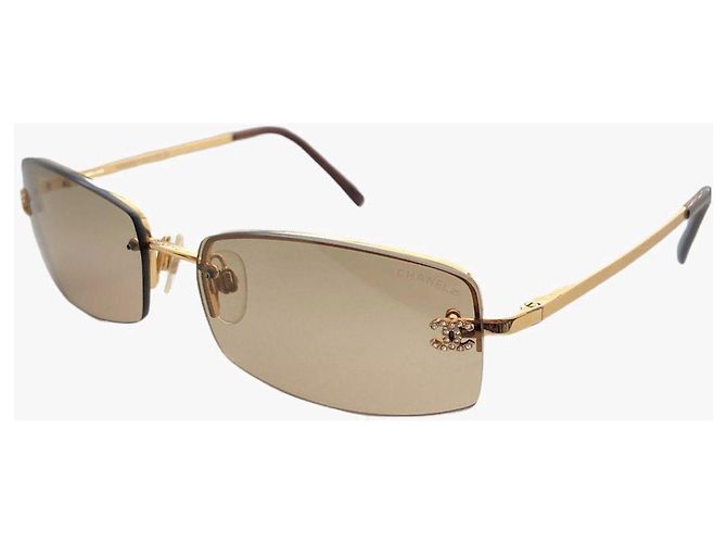 Occhiali da sole Chanel Marrone Oro Plastica D'oro