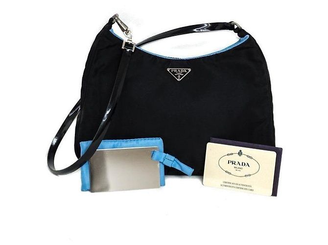Bolsa Prada Cleo em nylon preto e couro envernizado azul