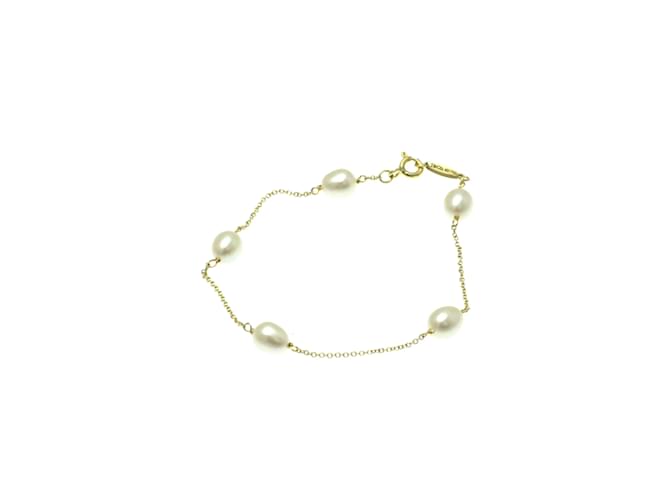Tiffany & Co Pulseira de charme de pérola de água doce Tiffany By The Yard Dourado Ouro amarelo  ref.1859856