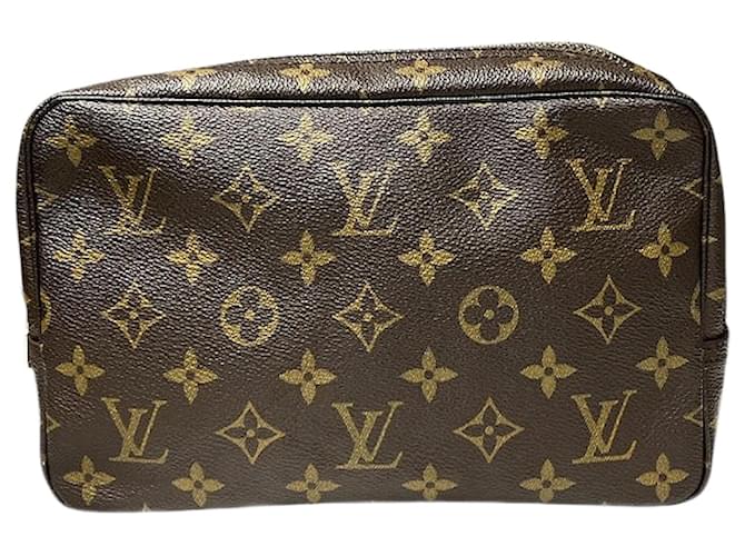 Louis Vuitton Monogram Toiletry Clutch  Brown Cloth  ref.1870576