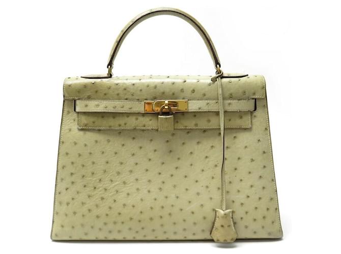 Hermès BOLSA HERMES KELLY 32 SELLIER DE CUIR DE AVESTRUZ TILLEUL VINTAGE Bege Couro de avestruz  ref.1880561