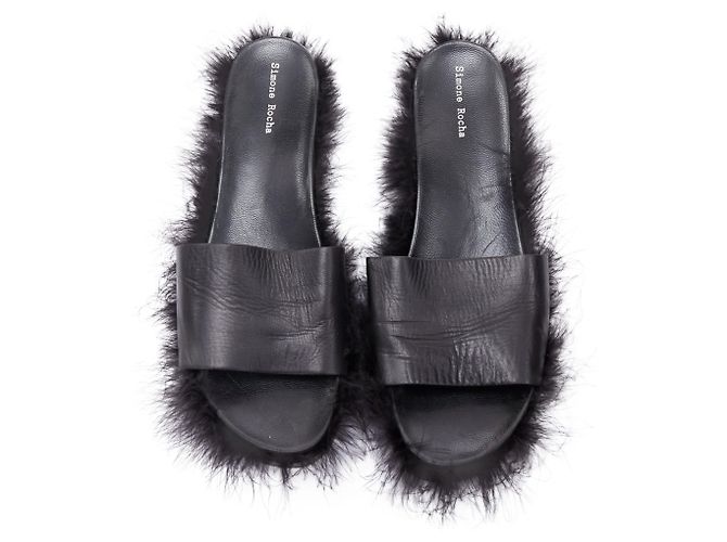 Mules en cuir avec plumes de Simone Rocha