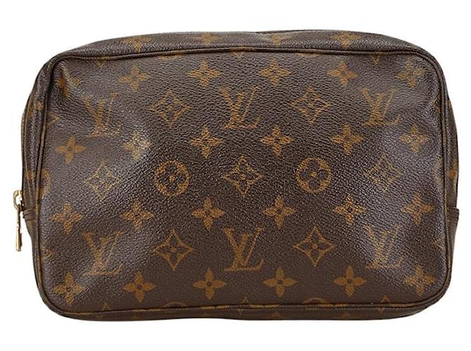 Louis Vuitton Monogram Toiletry Clutch  Brown Cloth  ref.1902576