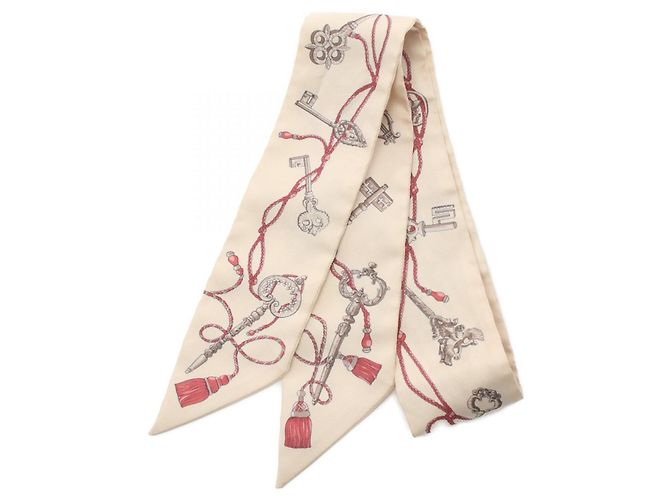 Bufanda Hermès de seda Twilly Las Llaves a Lunares Castaño Beige