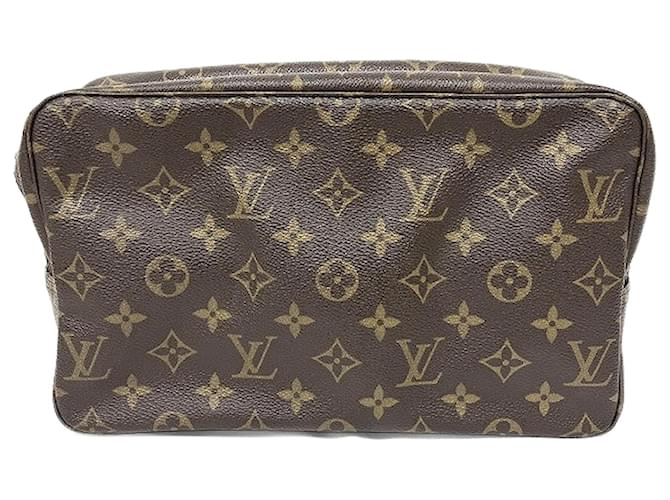 Louis Vuitton Monogram Toiletry Clutch Brown Cloth  ref.1902982