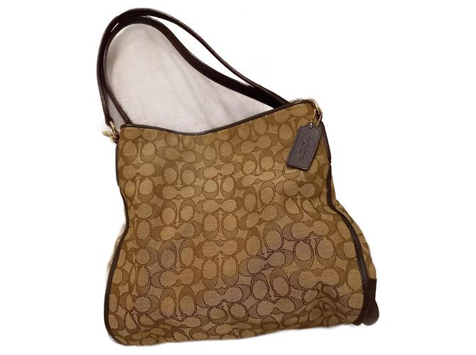 Bolsa de ombro Coach em couro chocolate