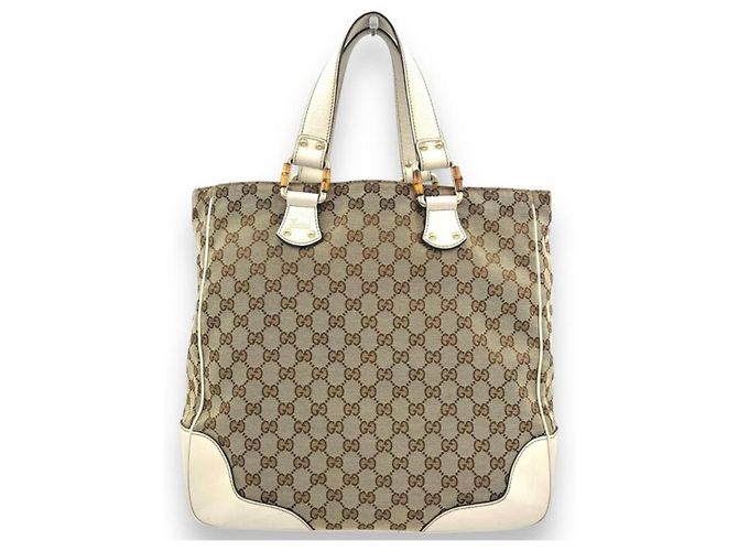 Bolsa Gucci Modelo GG Canvas Bamboo Marrom Branco Bege Creme Fora de branco