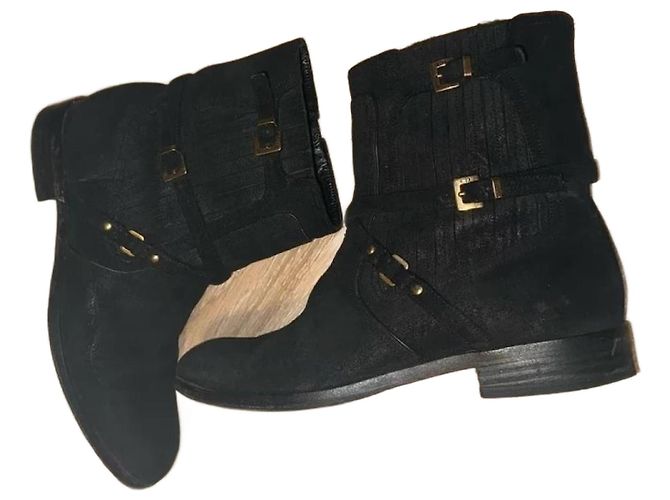Bottines Dior en cuir noir