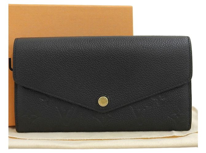 Sarah Monedero de cuero Monogram Empreinte Louis Vuitton