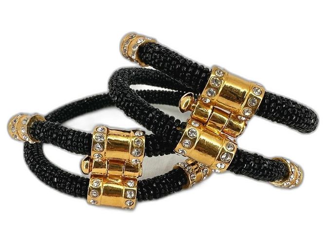 Dior Brazaletes de serpiente de Gianfranco Ferre Negro Dorado Gold hardware