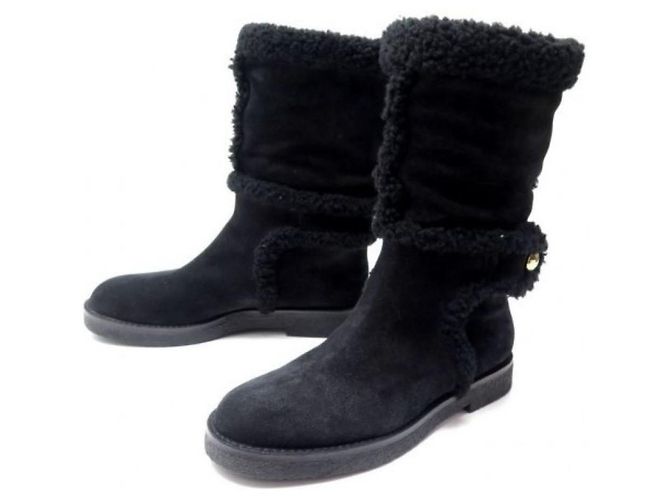 Stivali Louis Vuitton in pelle e pelliccia neri Nero