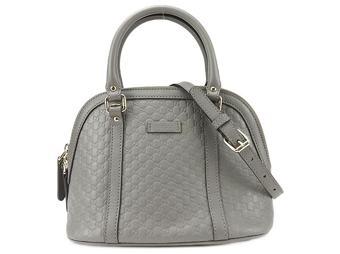Bolsa de ombro em couro Micro Guccissima da Gucci Marrom