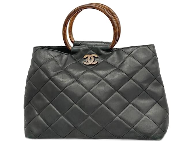 Timeless Chanel Black Lambskin Handbag Leather  ref.2017970