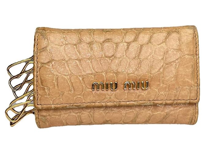Pochette en cuir beige Miu Miu