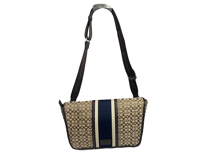 Bolso de mano de cuero beige Sufflette Signature de Coach