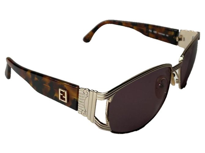 Gafas de sol de metal dorado Fendi
