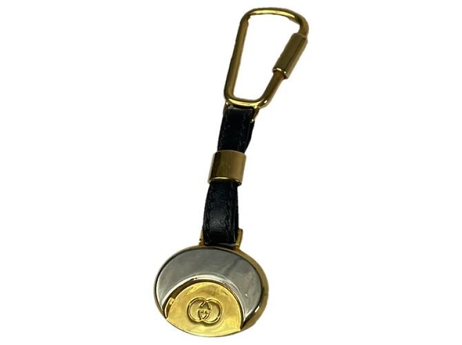Pingente de aço dourado Gucci